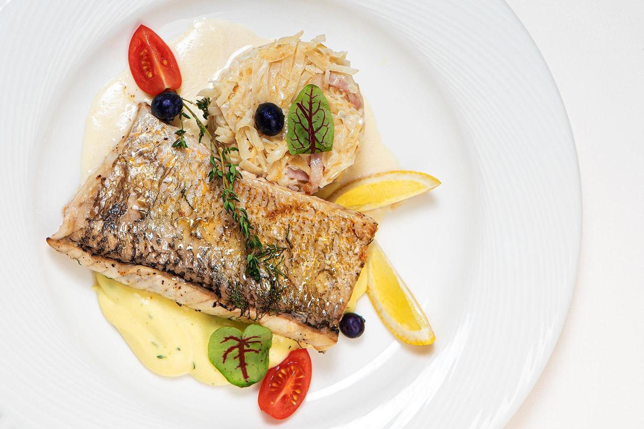 Boutique Odyseja & Spa Ciechocinek Exterior foto A prepared dish of Arctic char